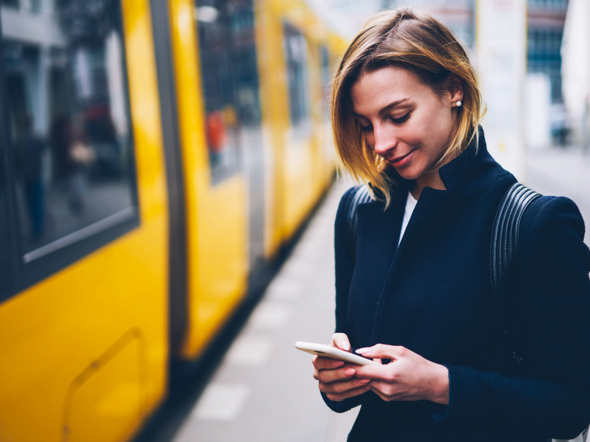 Woman getting on train