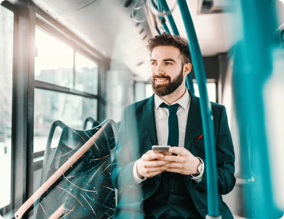 Man on phone on tram