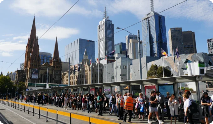 City with people waiting for train